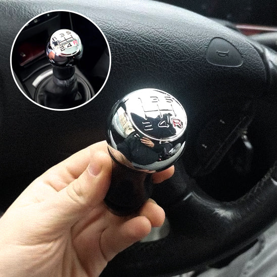 pommeau de vitesse interieur voiture
main